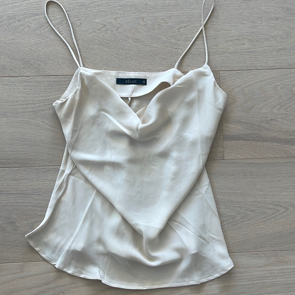 Cream deluc tank size small